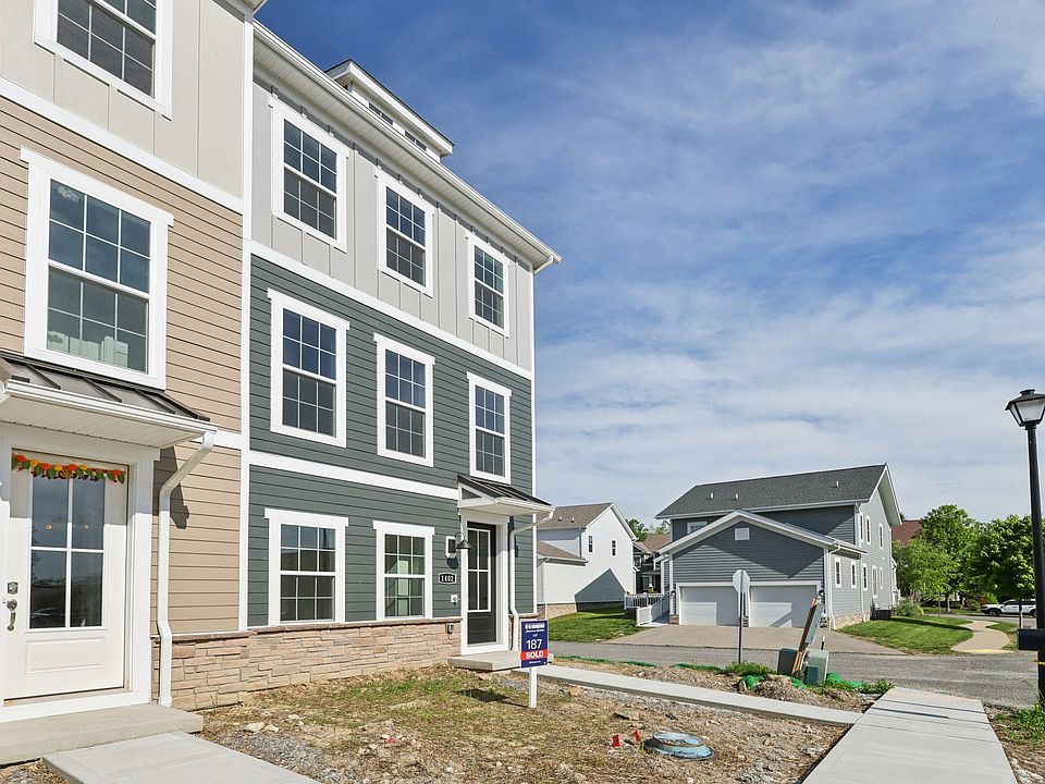 1402 COMMONS - Front / Side View of End Unit Townhome