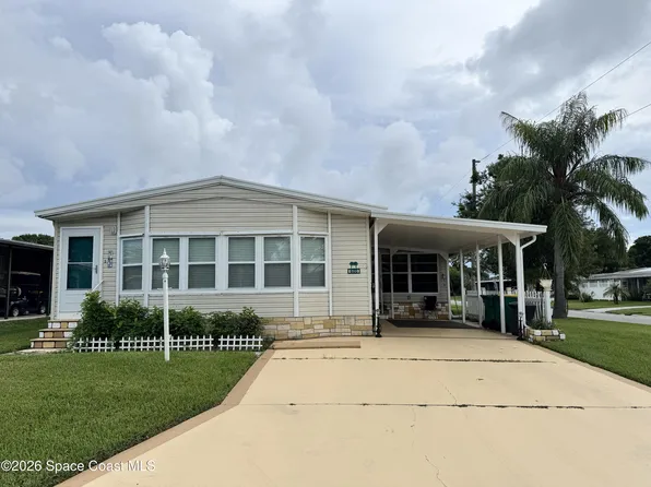 600 Dolphin Cir, Barefoot Bay, FL 32976