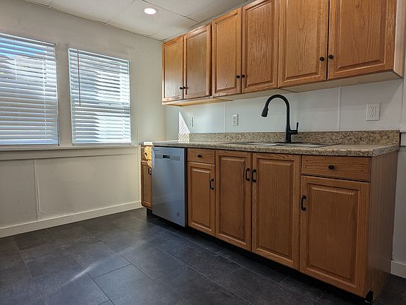 New appliances, hardware, and high efficiency LED lighting in kitchen