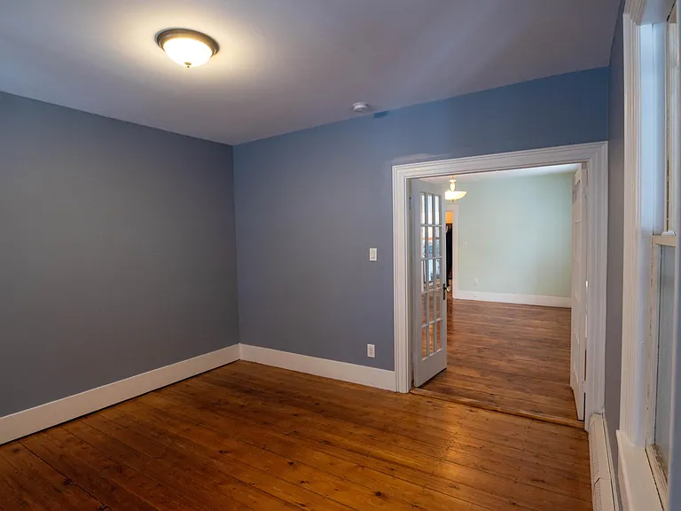 view from inside the bedroom to the living room