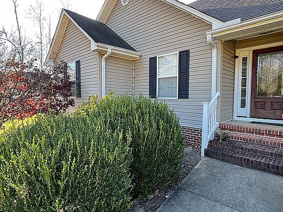 Left of house/office window 