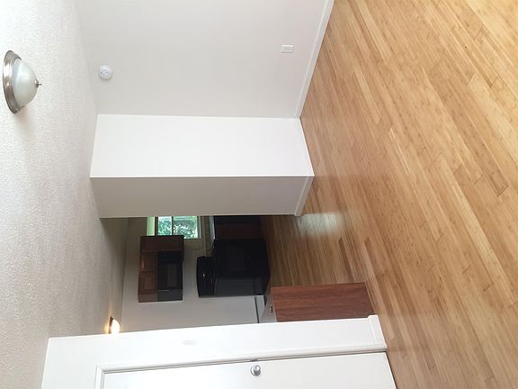 Living room into dining area and kitchen