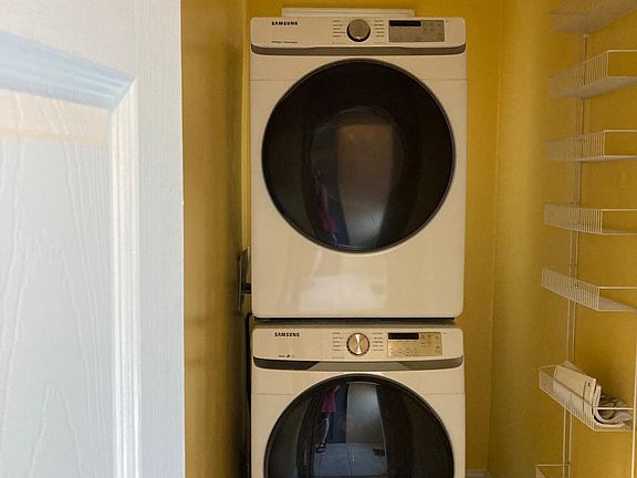 Newer washer/dryer off kitchen