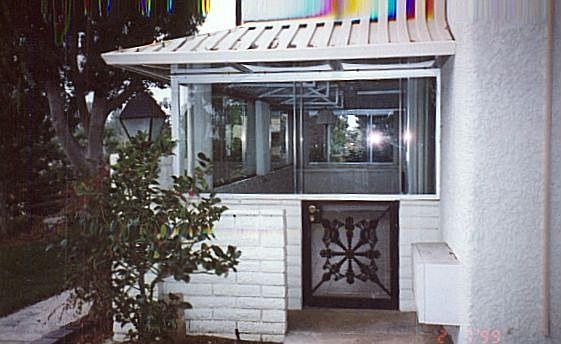 Enclosed Patio with a Green belt View