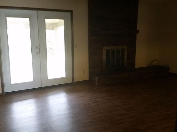 View from open area in kitchen looking into living room.