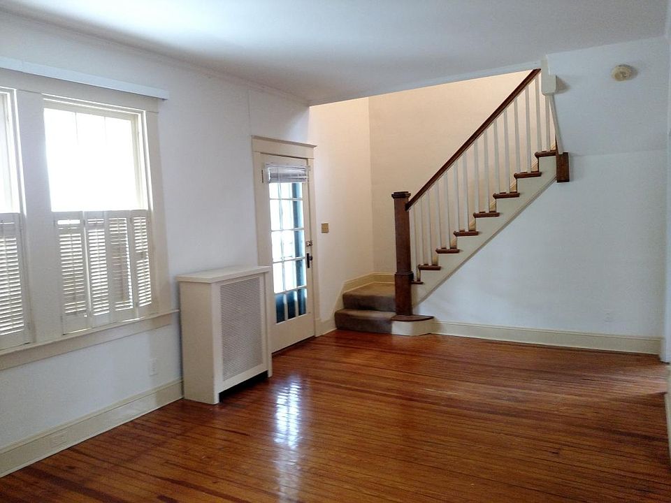 Living room and carpeted steps