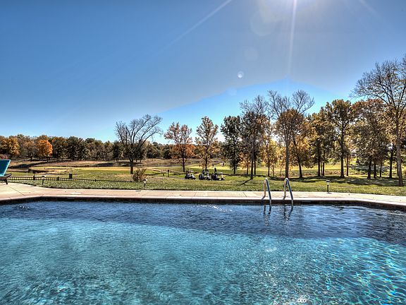 Pool overlooking golf course