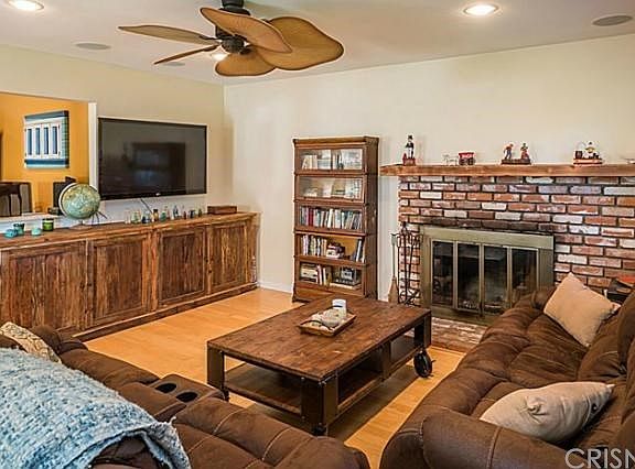 Family Room with wood burning fireplace.