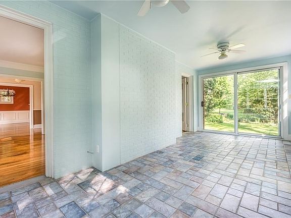 The large Family Room has plenty of light and a door to the backyard.