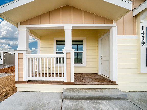 Upgraded front door, upgraded concrete board siding & accents.  Over-sized Low-E vinyl windows.