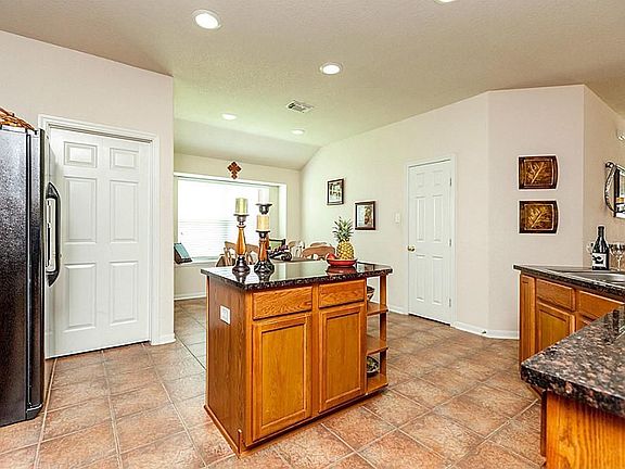 LARGE OPEN KITCHEN WITH BREAKFAST AREA ~