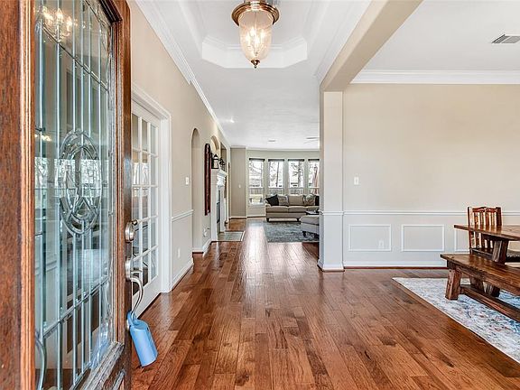Welcome home. Open concept floor plan with high ceilings and gorgeous hardwood floors.