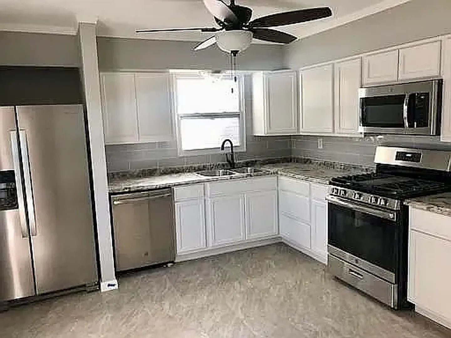 2716 Avenue H 2 Bed/1 Bath in Council Bluffs | Updated Kitchen, Full Appliance Package, Fenced Yard — Photo 2
