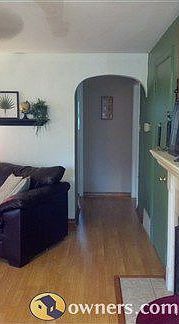 Hallway off living room leading to bath and 2 bedrooms