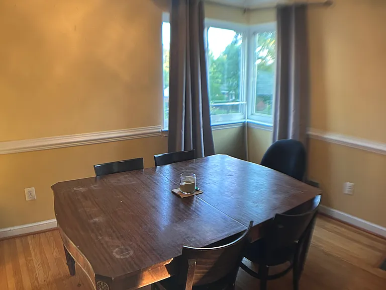 Dining area showing capacity for larger seating options.