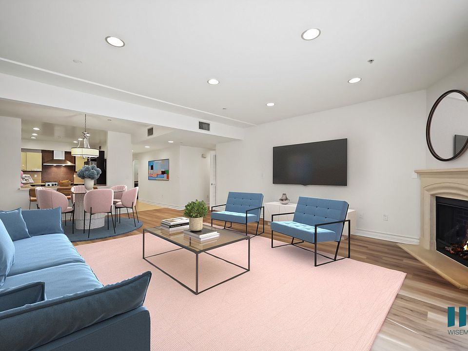 Large-Size Open-Concept Kitchen, Dining, and Living Room Space with Fireplace