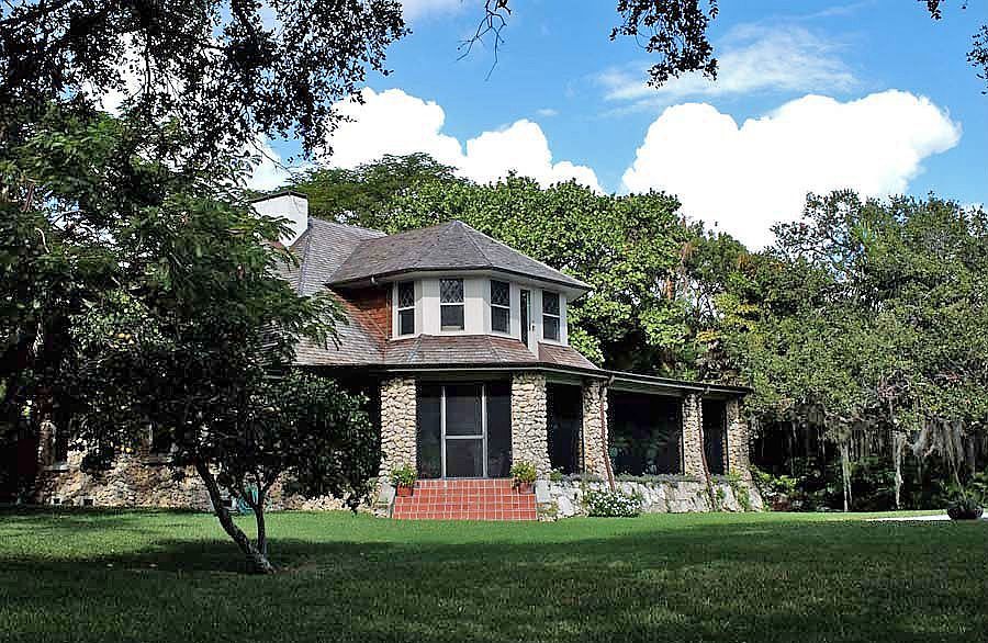 Landmark home built of Dade County Pine and Coral Rock, completely updated