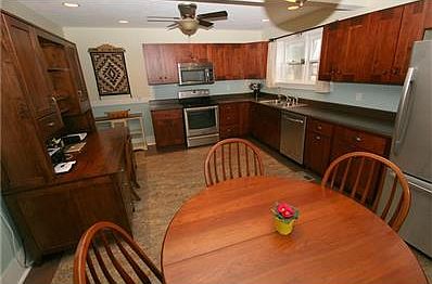 Totally updated eat-in-kitchen with new cabinets, stainless appliances, high grade linoleum flooring