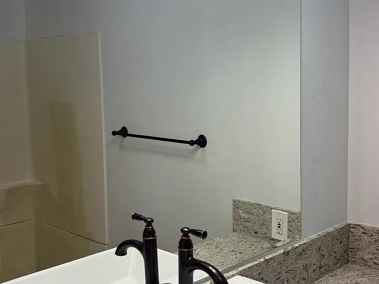 Restored bathroom with NEW light fixtures, countertops, sink!