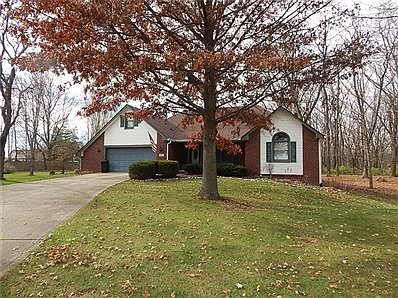Rare setting! End of culdesac and backed up to 9 acre woods.  Ranch with basement and bonus room.