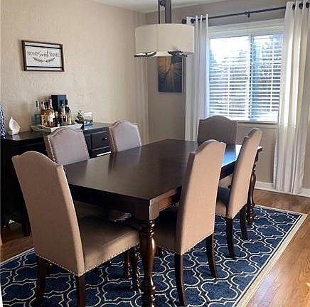 Classic dining room with refinished hardwoods