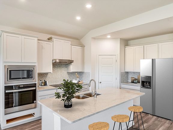 Enjoy cooking delicious meals in this gourmet kitchen.