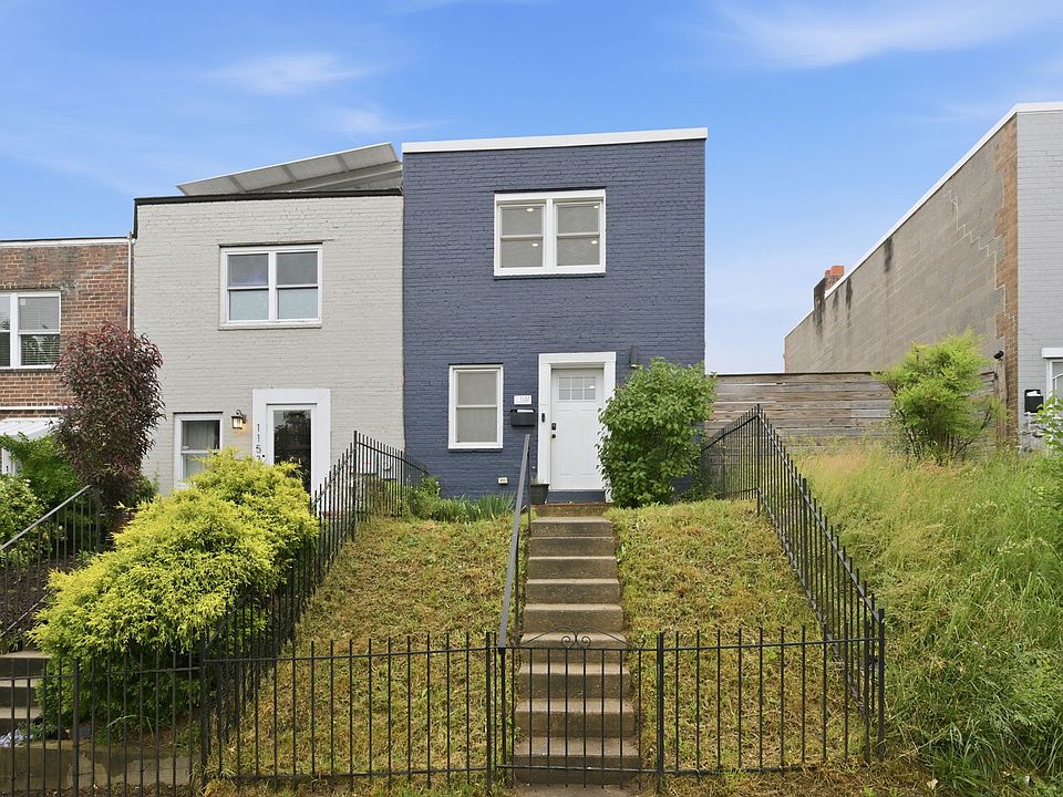Front Exterior of Townhome with Charming Curb Appeal