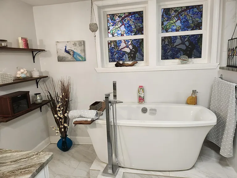 Master bath has deep soaking tub