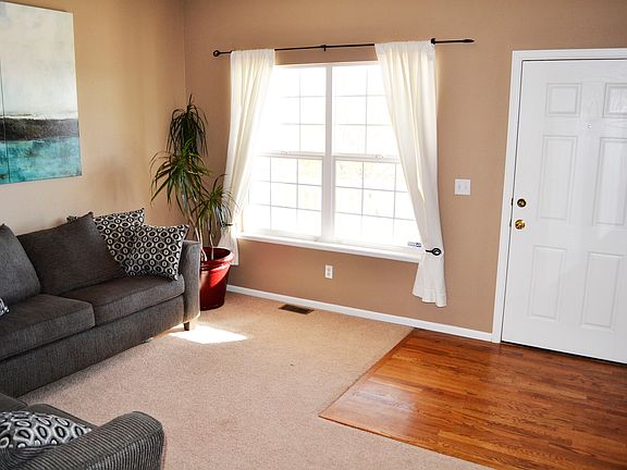Wood entry and formal living room.