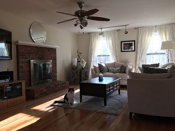 Large Family Room that leads to outdoor deck, hard wood floors