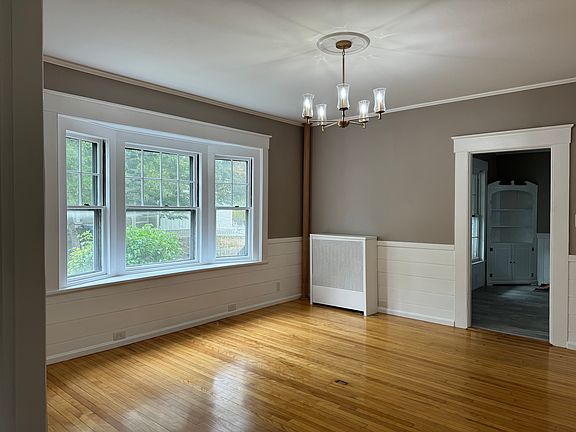 Dining Room with bay window and hardwood floors!