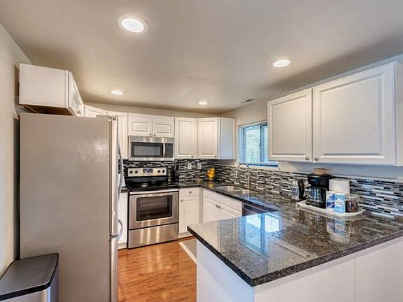 Complete kitchen with granite countertop