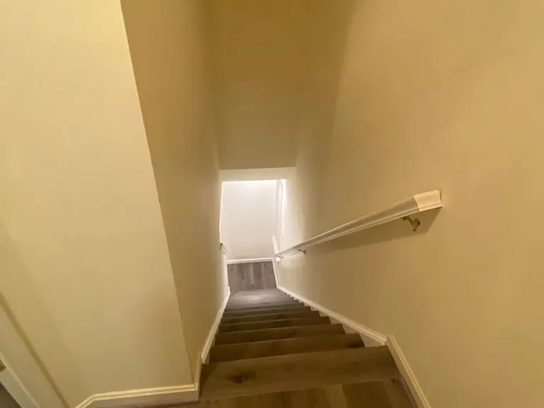3rd floor stairs going down to the 2nd floor