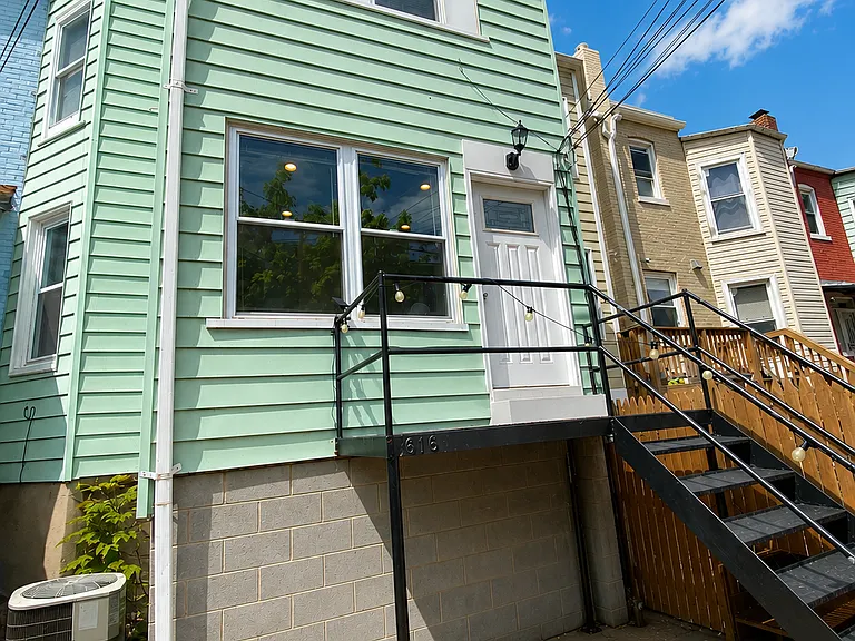 Back exit and patio. Fence was replaced in 2026