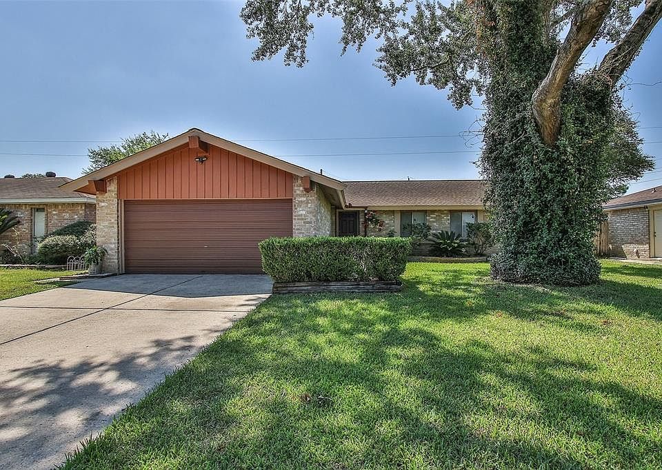 Front of home, plenty of parking. Large Oak Tree for shade.