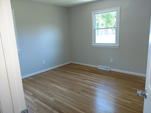 Master Bedroom, beautiful hardwood floors refreshed.