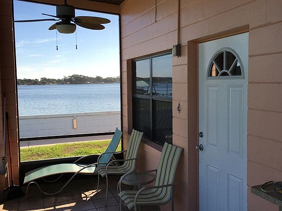 screen porch overlooks lake