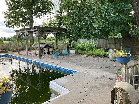 Backyard pool and patio area