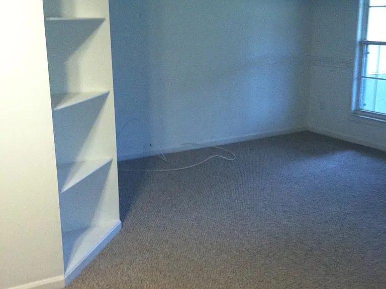 Large lower level family room with entry door