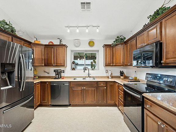 4th image of 8927 W CAROL Avenue