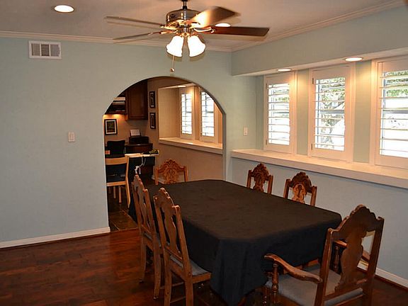 When you enter the home you enter through a small hall with the formal dining room on your right and
