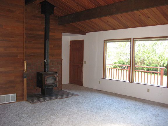 living room with wood stove