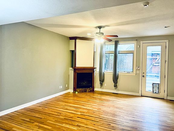 Living room with gas fireplace.