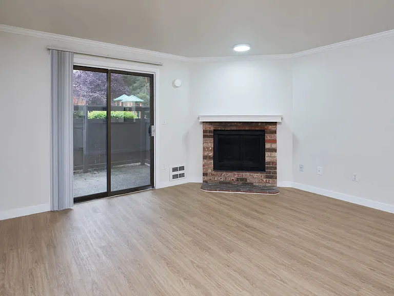 Living Room with Fireplace and Patio