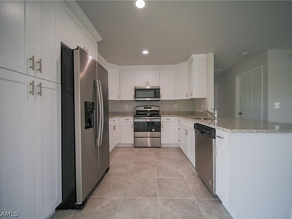 4th image of 9029 Maywood Cir W