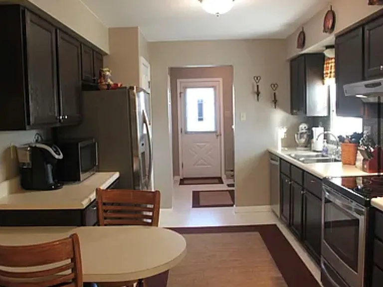 Kitchen to Laundry Room and Side Deck