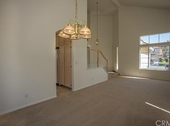 Large dining room with soaring ceilings is waiting for your dinner parties!