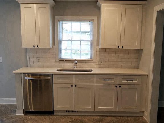 stainless appliances. quartz countertops. soft close cabinet