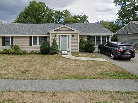 Front of home plenty of parking for 4 cars