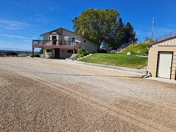 Covered Patio, Entrance, North yard area and Garden Area 2026
